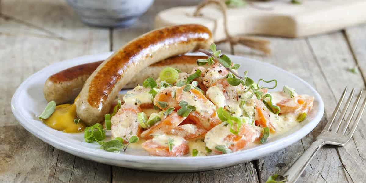 Bratwurst mit Rahm-Karotten – Rezept für den Thermomix®